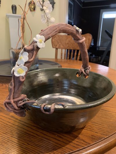 bowl with faux wood handle and flowers