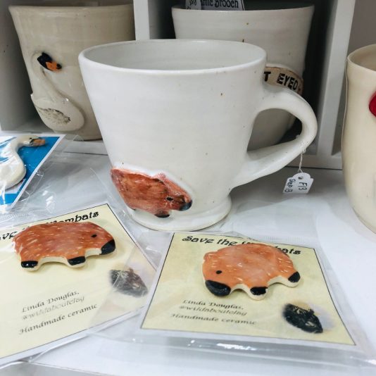 save the wombats pins and mug